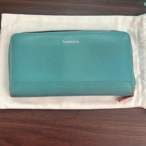 Tiffany and Co wallet. Zip around closure. With cloth bag